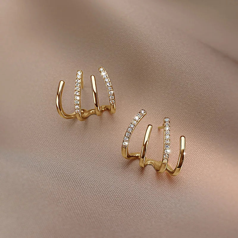 Clawette™ 4-Claw Earrings — Subtle Sparkle, Everyday Glam
