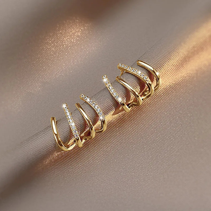 Clawette™ 4-Claw Earrings — Subtle Sparkle, Everyday Glam