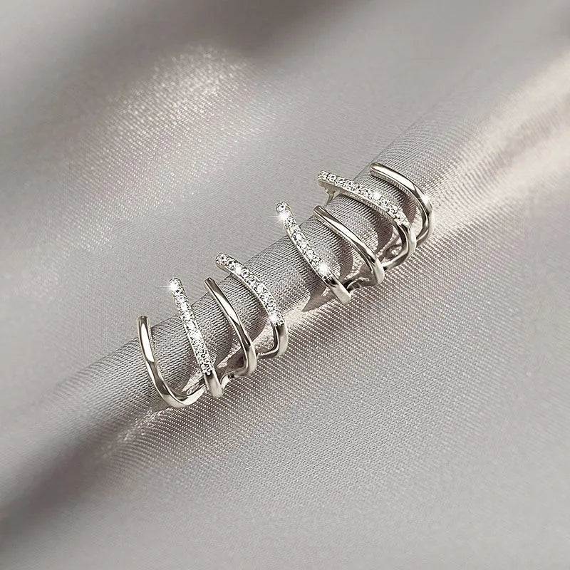 Clawette™ 4-Claw Earrings — Subtle Sparkle, Everyday Glam
